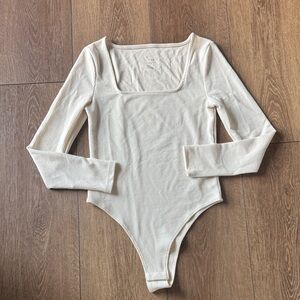 A New Day Ribbed Cream Long Sleeve Bodysuit
